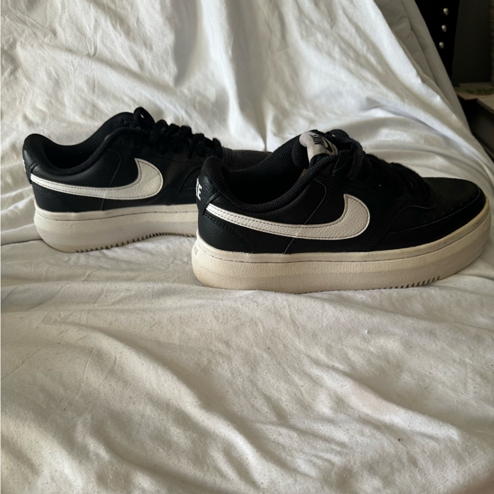 Women’s Black/White leather Nike Alta size 8
